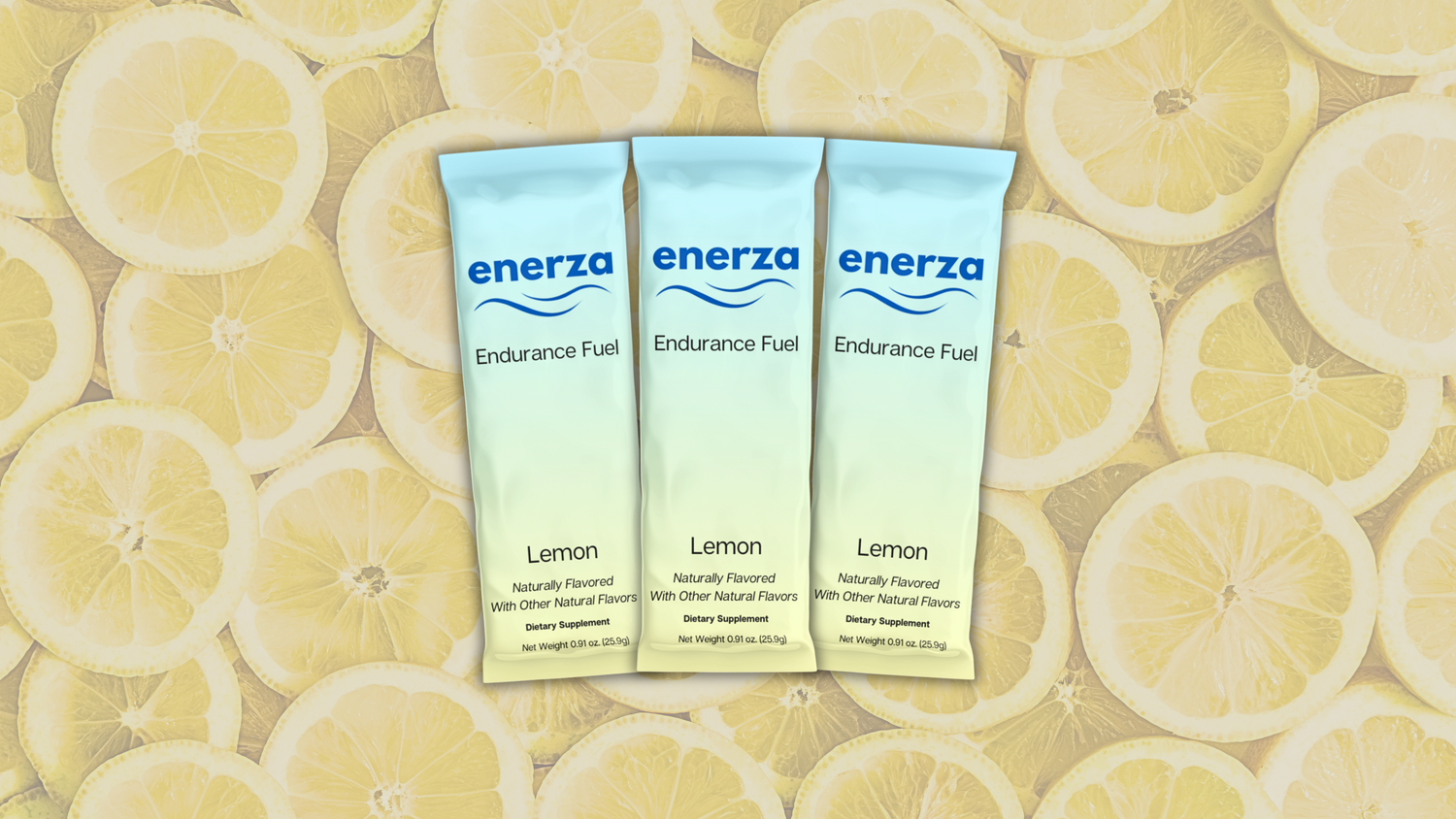 3 sticks of Enerza endurance fuel drink mix for performance. Blue and yellow packaging for the lemon flavor with sliced lemons as the background.